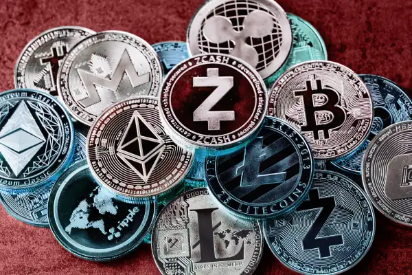 Multiple cryptocurrency coins stacked on top of each-other (Bitcoin, Ethereum, Litecoin, zcash, ripple)