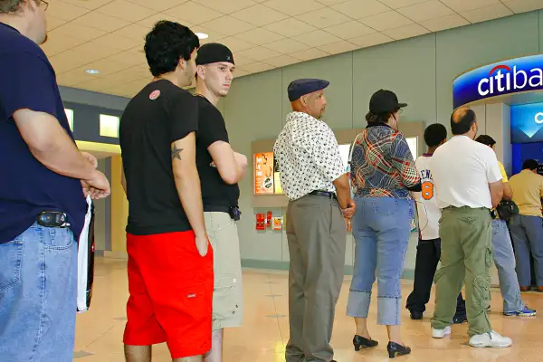 Line of people ready to use the ATM at Citibank