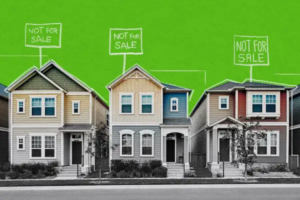 Row of houses with illustrated  NOT FOR SALE  signs on top of them