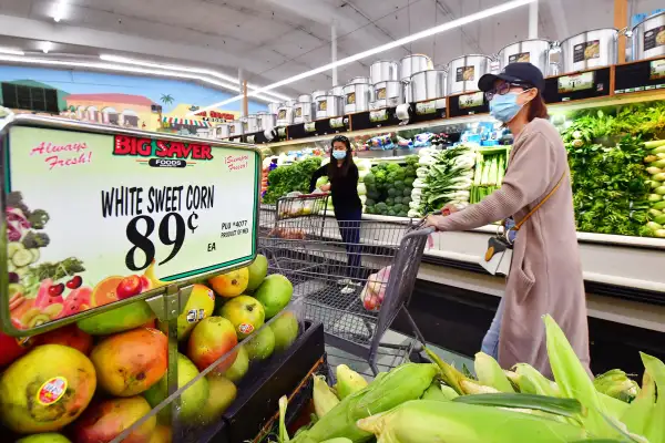 A woman shops for groceries in Rosemead, California on April 21, 2022