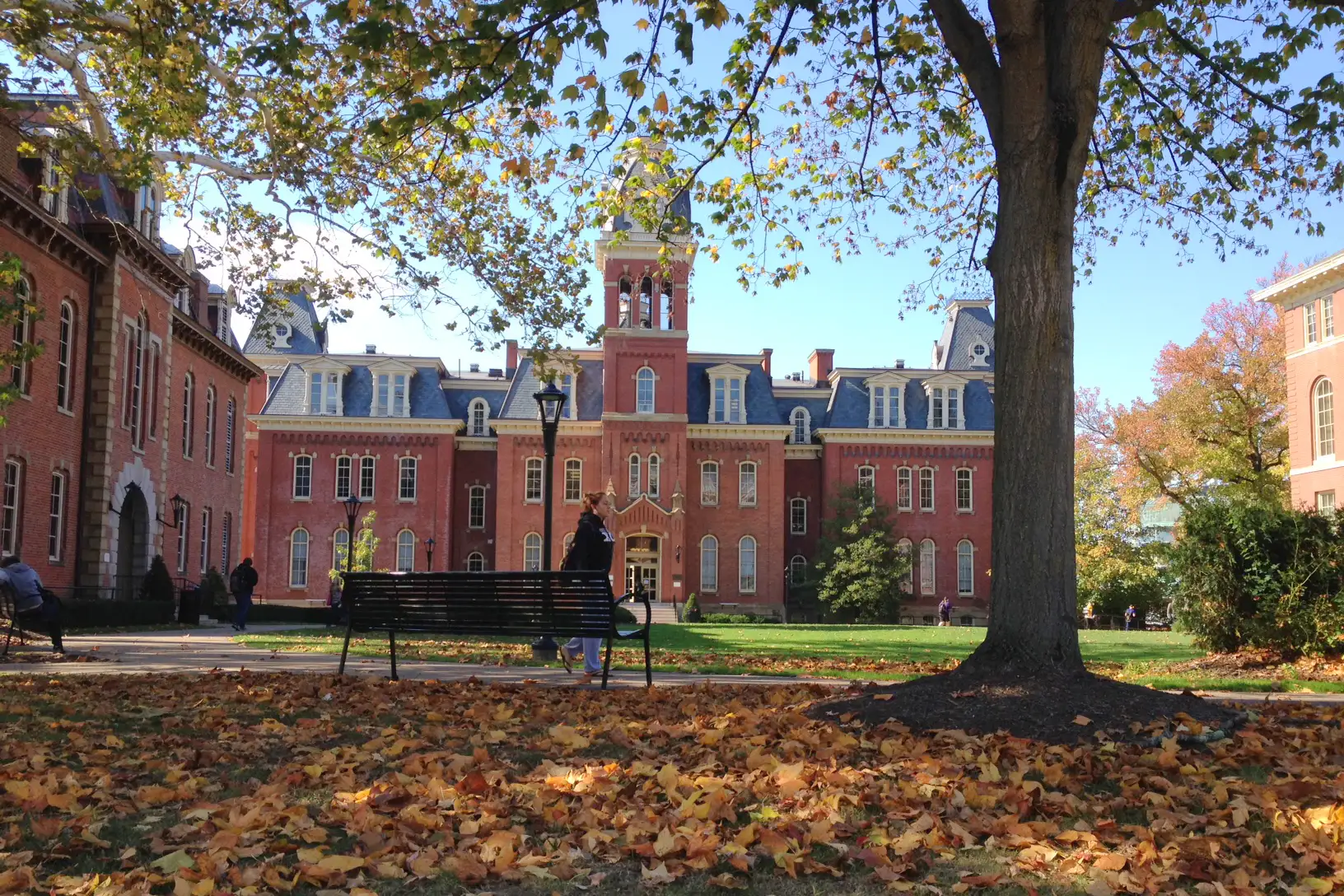 A student walks on campus at West Virginia University