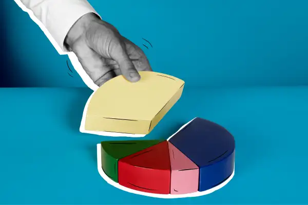 Hand taking a piece out of a block pie chart
