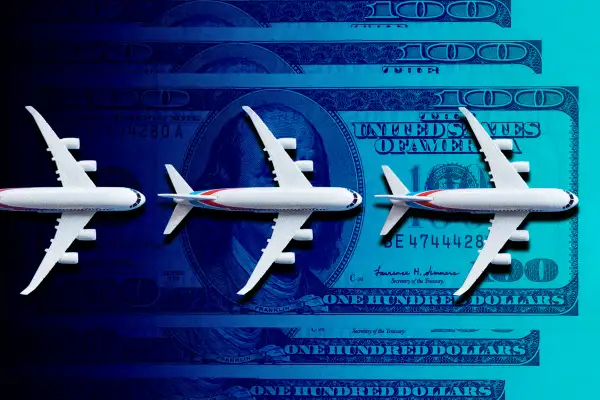 Photo Collage of three airplanes landing on top of multiple hundred dollar bills