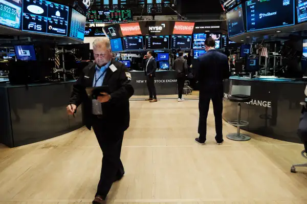Traders work on the floor of the New York Stock Exchange (NYSE) on June 27, 2022 in New York City