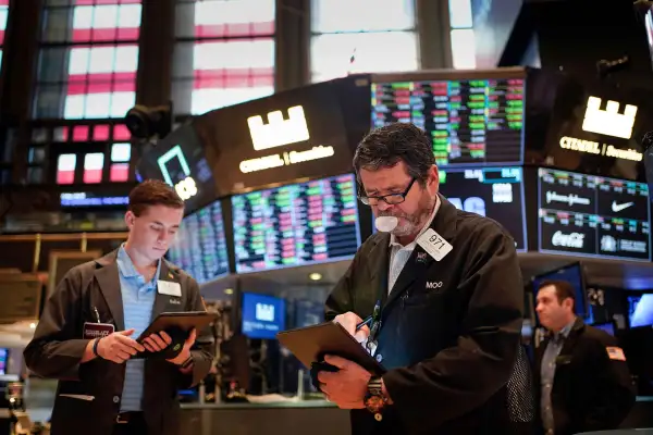 Man Looking At Tablet Inside Of The New York Stock Exchange Floor