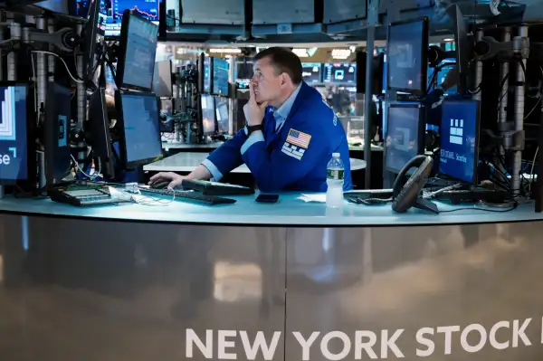 Traders work on the floor of the New York Stock Exchange (NYSE) in New York City