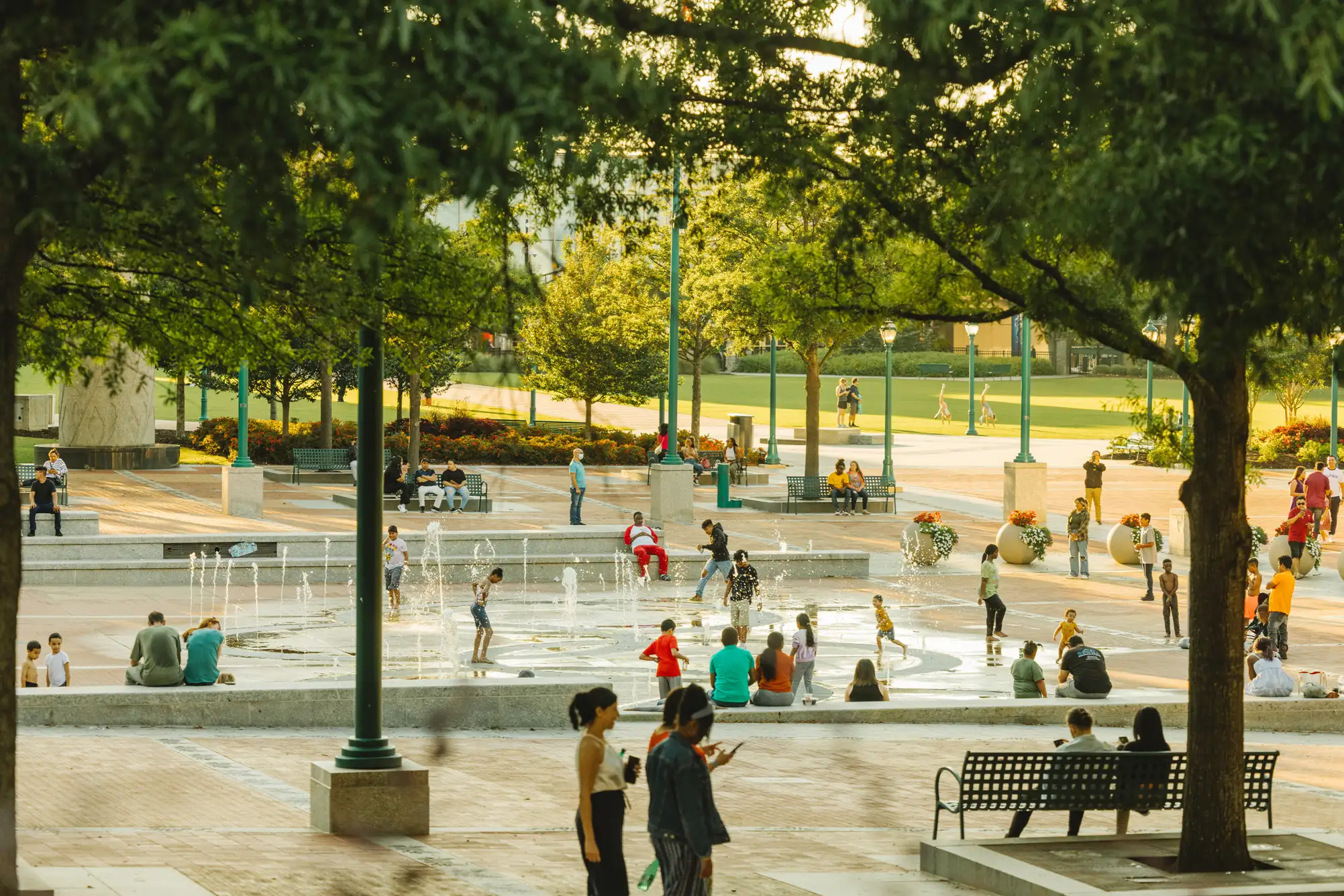 Kids playing at the fountain of rings at Centennial Olympic Park in Atlanta, Georgia