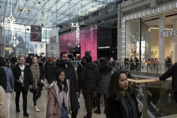 Crowds of Christmas shoppers inside a shopping centre