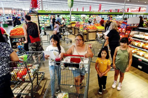 People shop for groceries in Riverside.