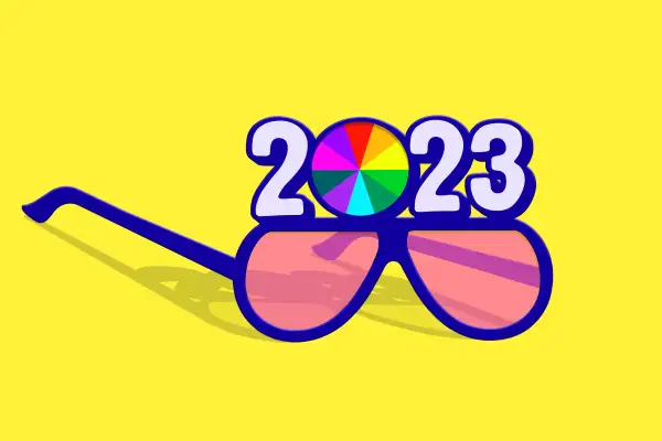 Illustration of 2023 glasses where the 0 is a colorful stock portfolio pie chart