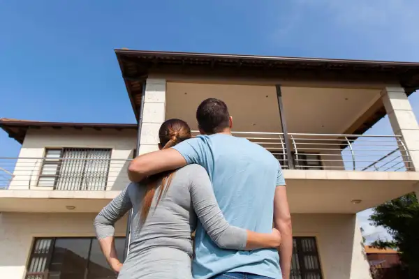 Couple looks at a house they are about to buy