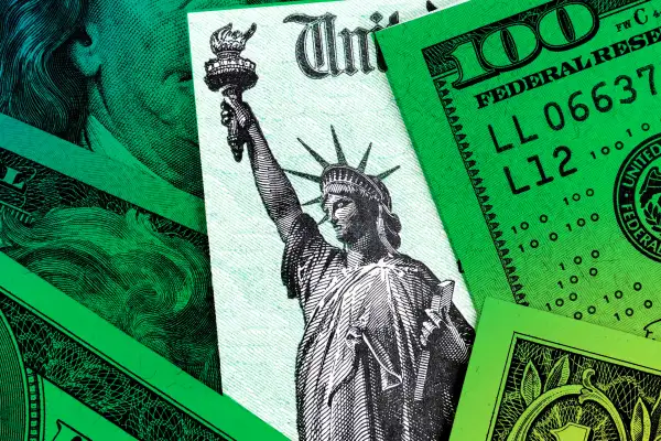 Photo illustration of a SS check and some big dollar bills