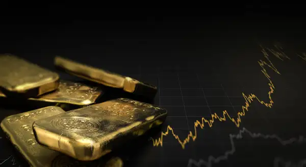 3D illustration of gold ingots over black background with a chart. Financial concept, horizontal image.