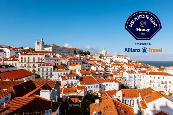 Lisbon cityscape with Alfama neighborhood on a sunny day with clear blue sky, Portugal