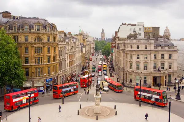 View down Whitehall of buses and Big Ben