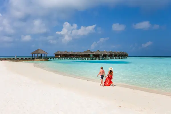 Couple walking on a beautiful beach