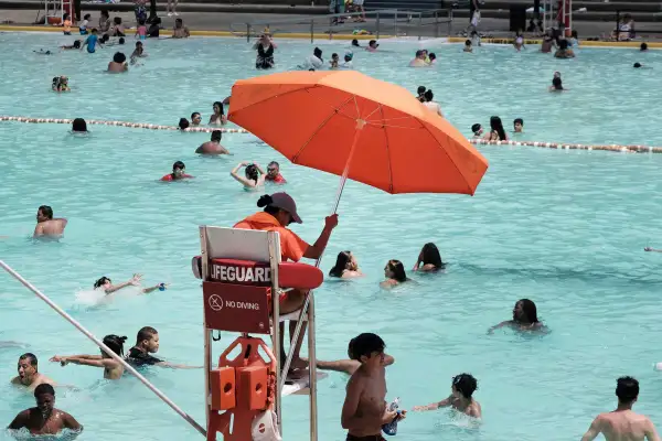 Photo of a public pool lifeguard on duty