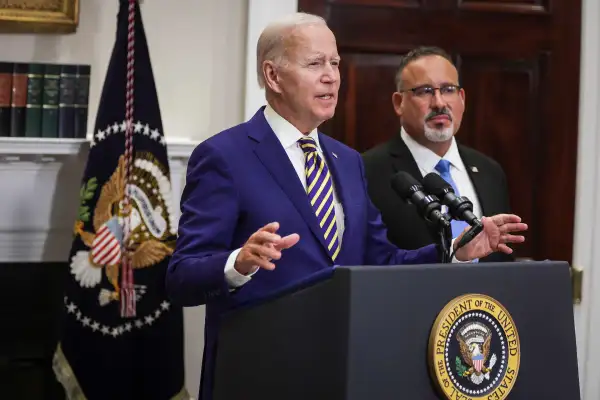 U.S. President Joe Biden speaks on the student debt relief plan with Secretary of Education Miguel Cardona
