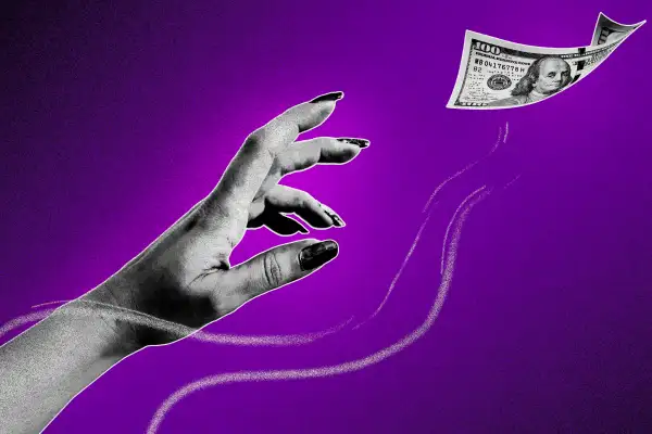 woman's hand reaching out for a dollar bill that is out flying of reach