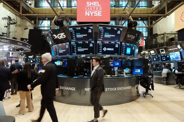 Traders work on the floor of the New York Stock Exchange in New York City.