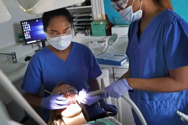 Dentist working on a patient's dental care