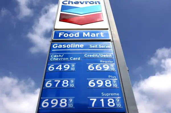 Gas prices are displayed at a Chevron station on September 19, 2023 in Los Angeles, California