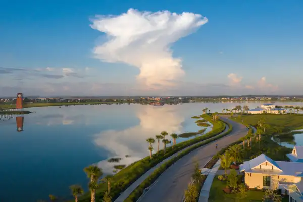 Aerial view of a housing neighborhood and a lake in Babcock Ranch