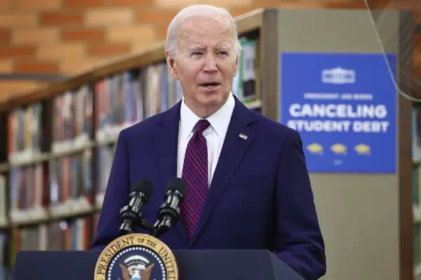 President Joe Biden talks about canceling student debt