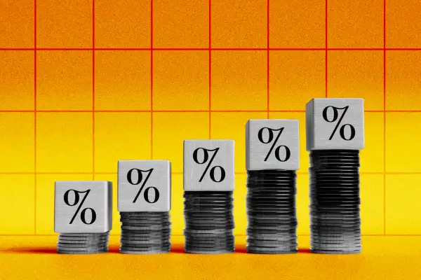 Ascending stack of coins with wood blocks on top displaying a percentage sign.