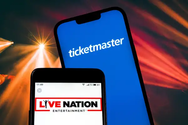 Photo collage of two smartphones one showing the  Live Nation Entertainment  logo and the other showing the  Ticketmaster  Logo