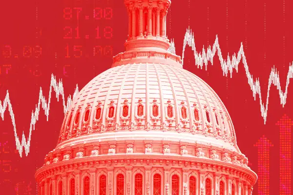 The Capitol building in red with stock graphs in the background