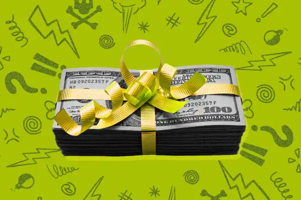 A stack of money wrapped with a gift bow