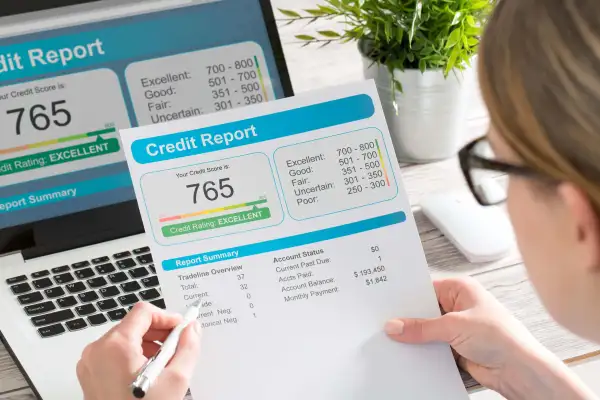 The woman checks the credit report and how many credit points.; Shutterstock ID 669987415; purchase_order:June 2022 Usage; job:; client:McClatchy; other: