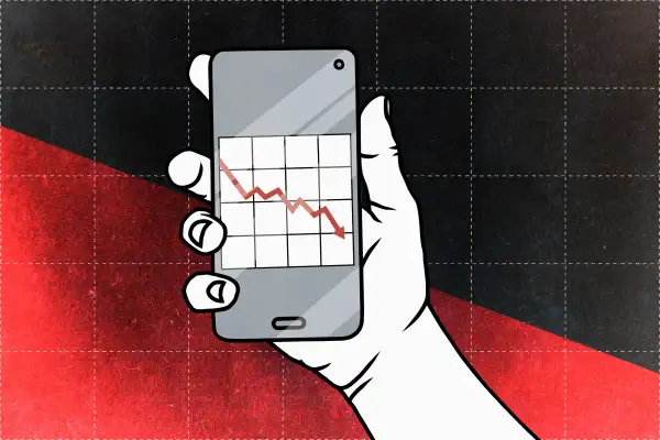 Photo illustration of a hand holding a smart phone with a red descending arrow and a grid in the background