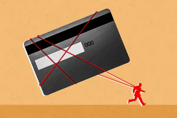 A figure running with a credit card tied to them.