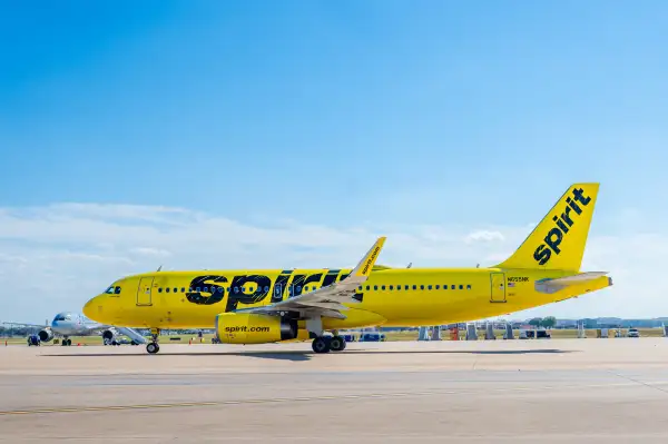 A Spirit Airlines aircraft prepares to depart from an Airport