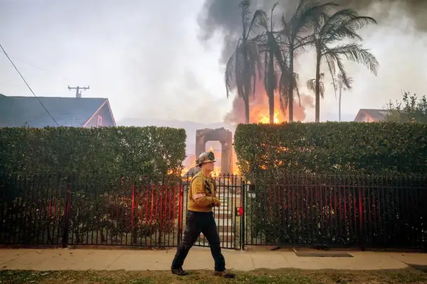 A fire fighter works the Eaton fire on Wednesday, Jan. 8, 2025 in Altadena, CA