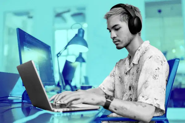 Young Man working in an office on his computer