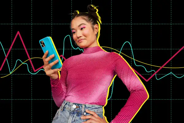 Photo collage of a young woman using a smartphone with a stock chart in the background